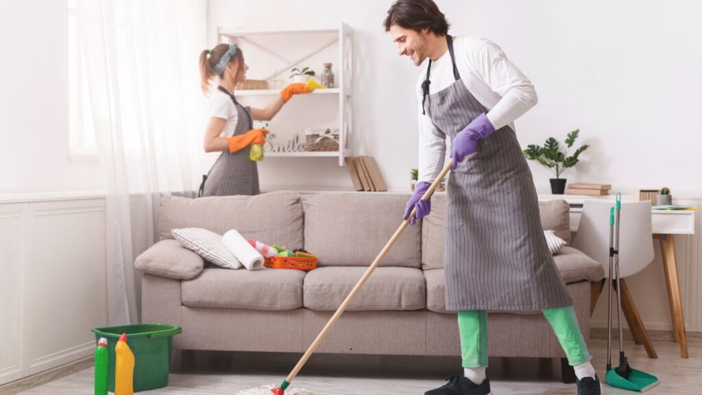 Expert staff performing villa deep cleaning in Al Shahama kitchen area
