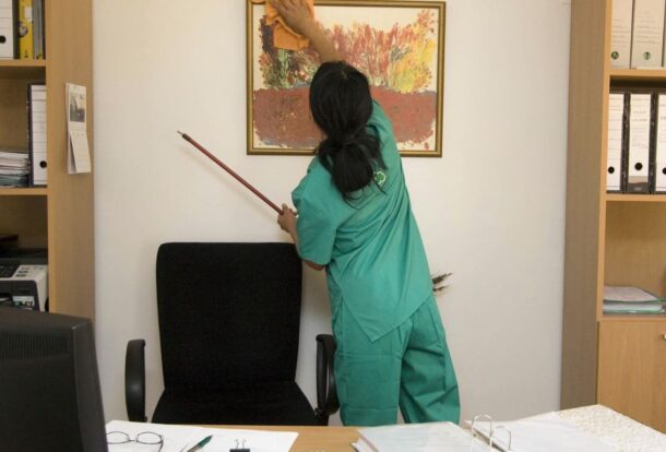 Before and after results of professional apartment cleaning services showing spotless kitchen